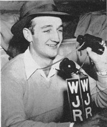 Tom Harmon at WJR mike in press box
